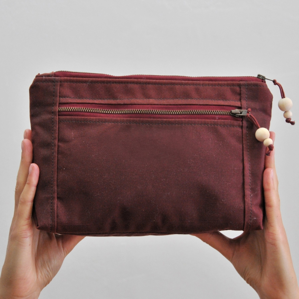 Maybe Mabel red wax canvas washbag