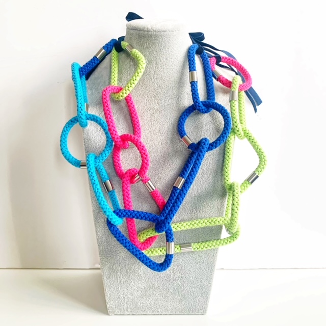 brightly coloured fabric geometric necklaces by Handmade by Tinni