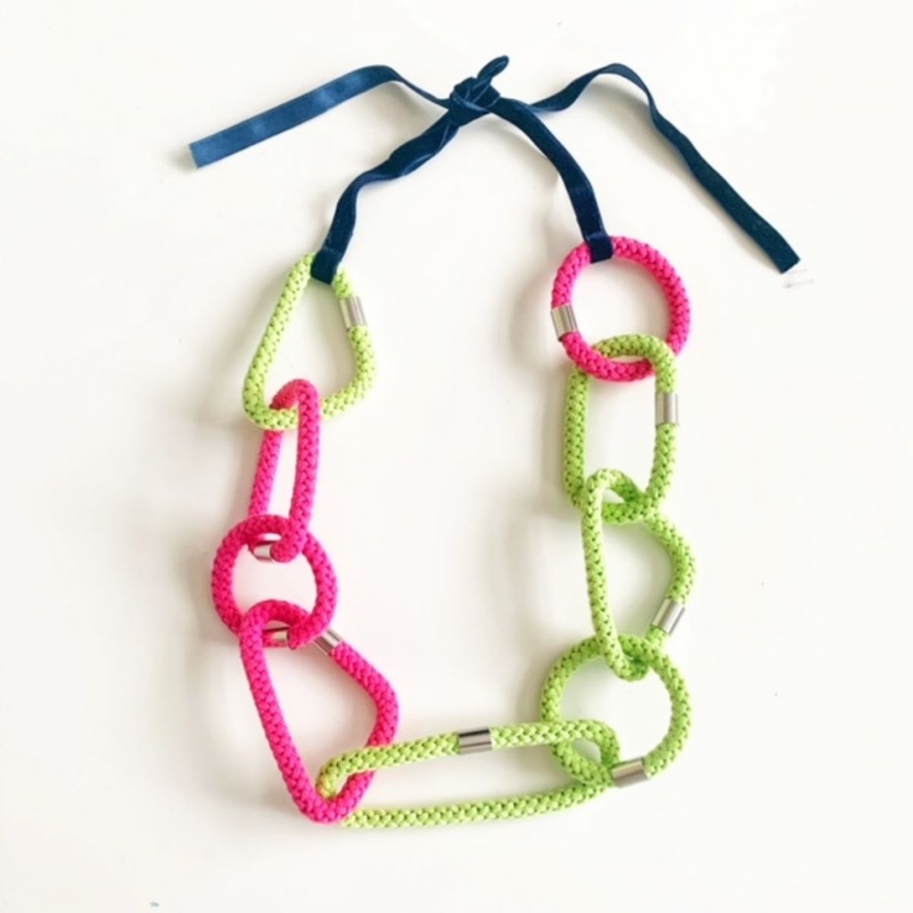 Geometric necklaces in pink and green by Handmade by Tinni