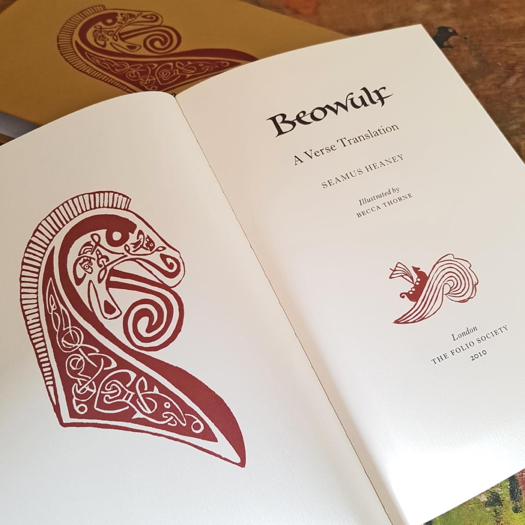 inside pages of Beowulf book with linoprint illustration