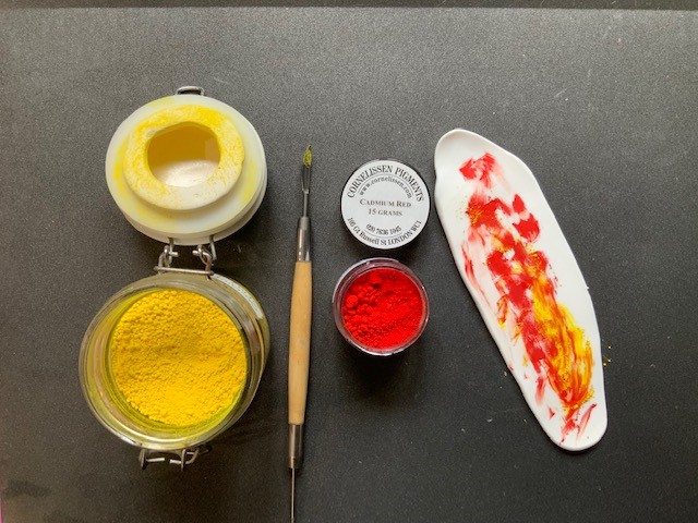 Colour Designs - bright powder paints in yellow and red