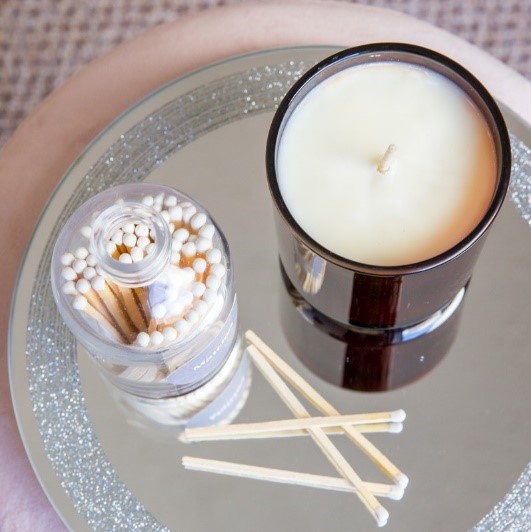soy candle on silver tray with matches by Vivian May
