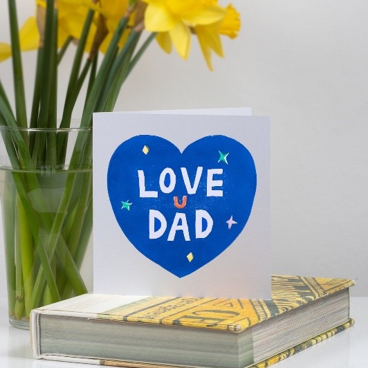 Card saying 'love u dad' in a blue heart shape with stars, by East Rabbit.