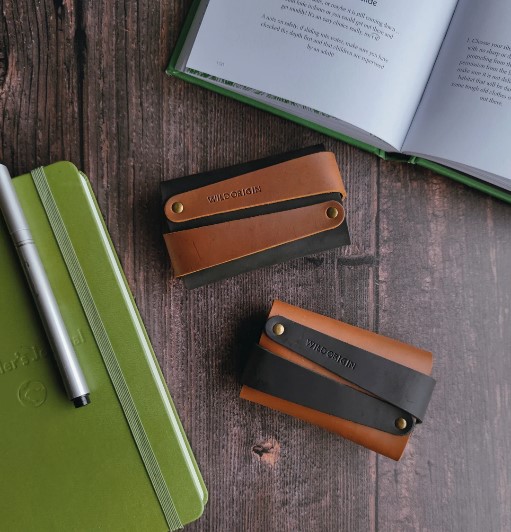 Black and tan leather wallets by Wild Origin.