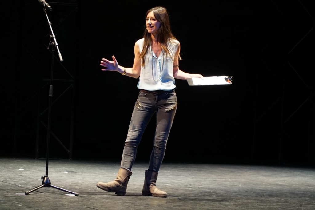 Natalie Fee giving talk on stage