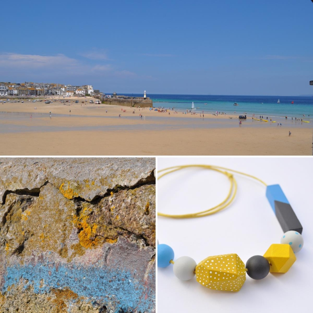 Trio of photos: 1. Cornish beach seascape 2. close up of rock with yellow moss and blue paint 3. Necklace with large painted irregularly-shaped wooden beads in shades of yellow, blue, grey and black, by Sea Pink Studio.