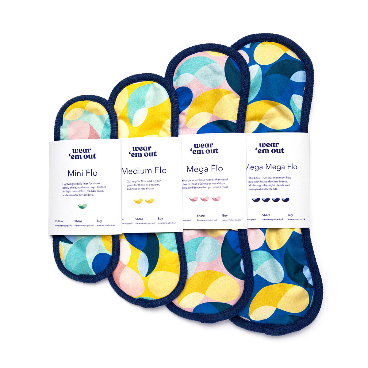 'Wear Em Out' fabric period pads in bright colours, in cardboard sleeve packaging, with variations 'Mega Flo', 'Medium Flo', and 'Mini Flo'.