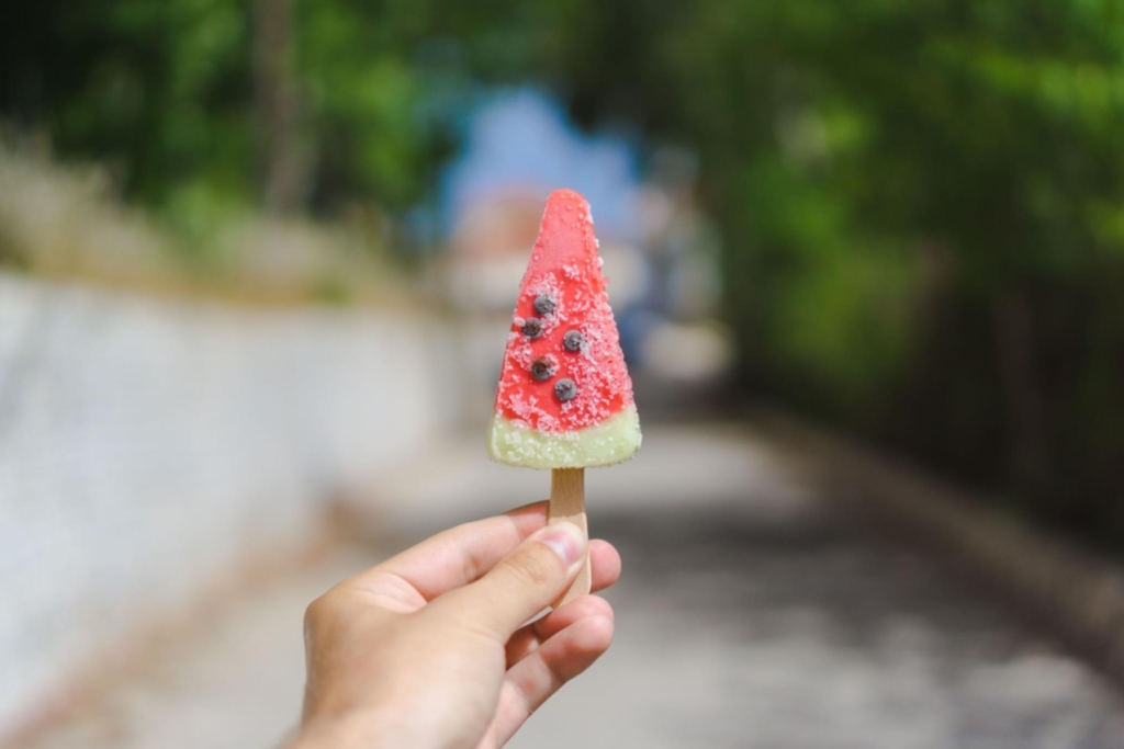 small watermelon shaped ice lolly on a stick