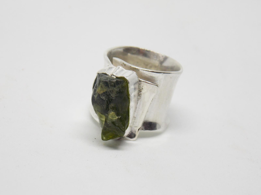 Chunky silver ring with green peridot stone, by Bethany May Silver.