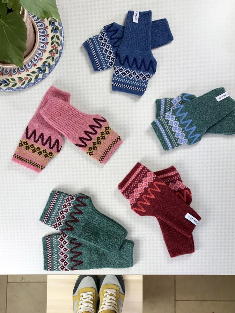 A selection of 'Blockley' patterned woollen fingerless gloves / handwarmers in various colours.