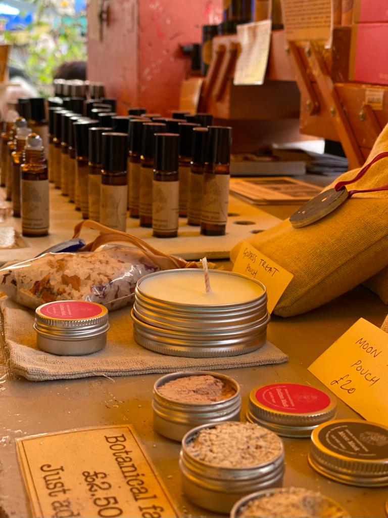 Bohobo Aromatherapies stall at Windmill Hill Market, showing face scrubs, candles and aromatherapy sprays.