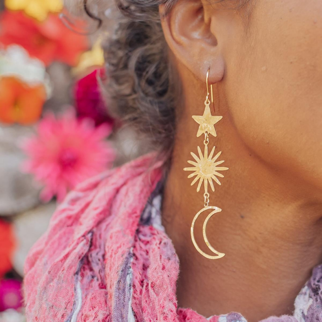 Hand beaten delicate brass earrings by Nic Danning, 'tempest celestial' with 3 pieces - star, sun and moon shapes.