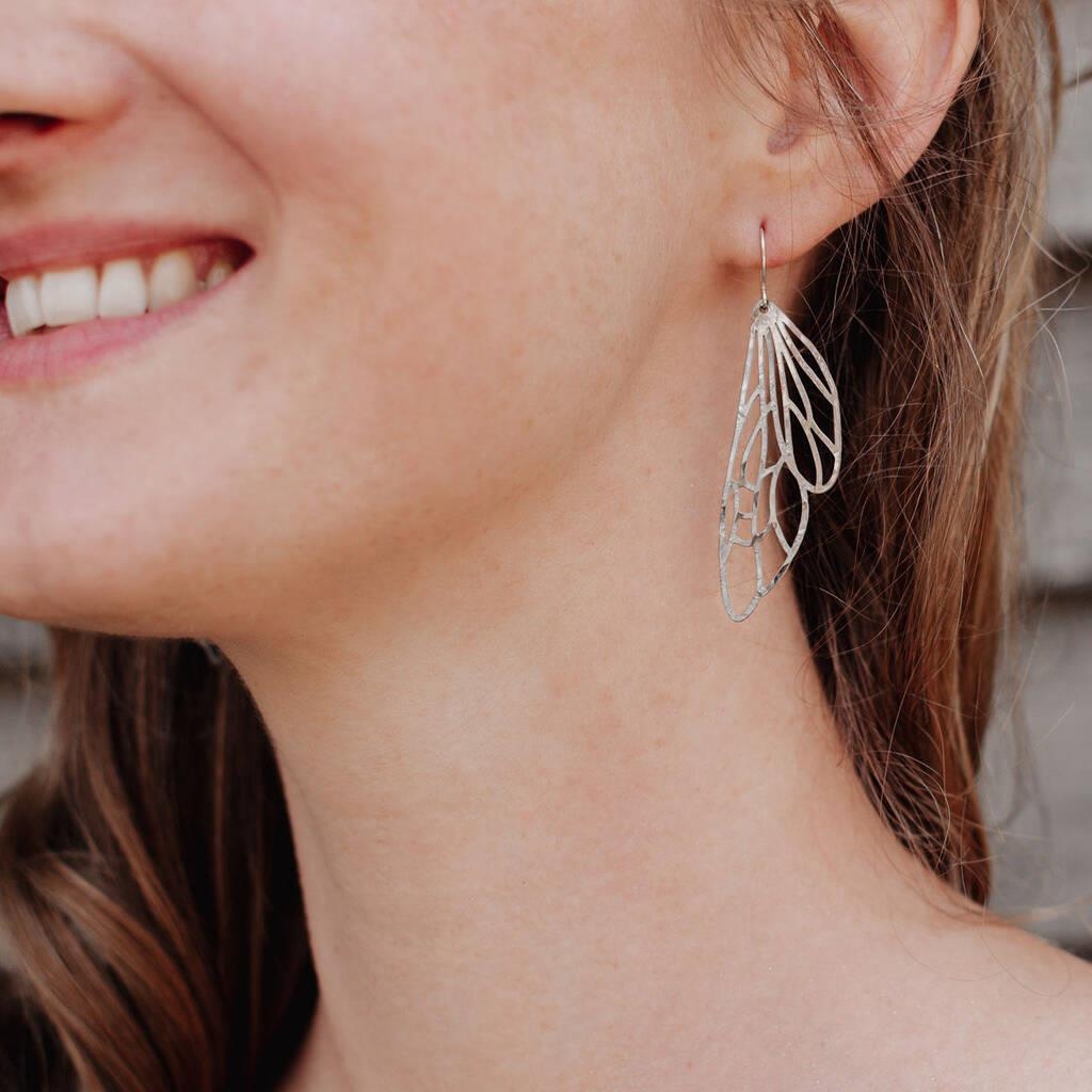 Hand beaten delicate steel earrings by Nic Danning, insect wing shaped 'gossamer dryad'.