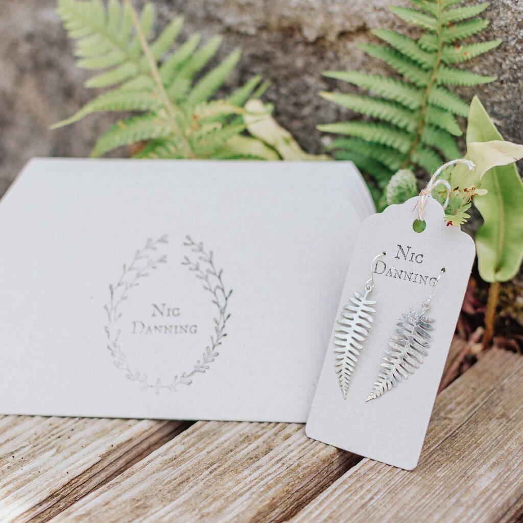 Hand beaten delicate steel earrings by Nic Danning, 'gossamer fern'.