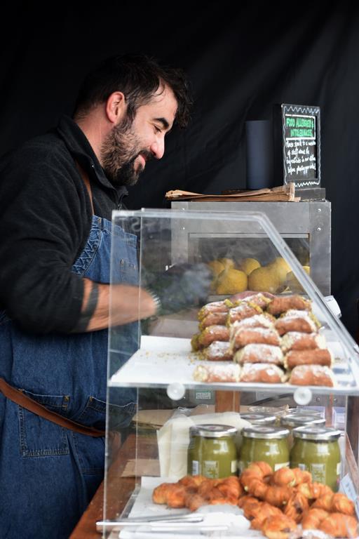 Francesco at his Ciccio's Kitchen market stall, selling Sicilian delicacies such as arancini.