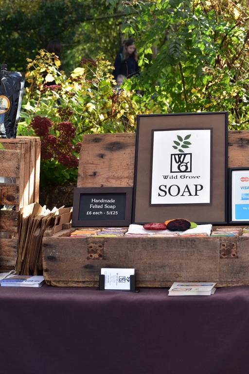Wild Grove handmade soap stall at Windmill Hill Market, featuring brightly coloured felted soaps.